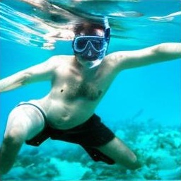 Generated sample: a snorkeler underwater