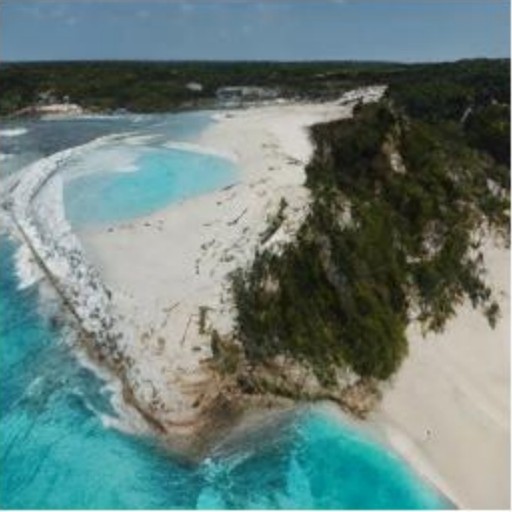 RECON: an isolated beach paradise with turquoise waters and lush greenery